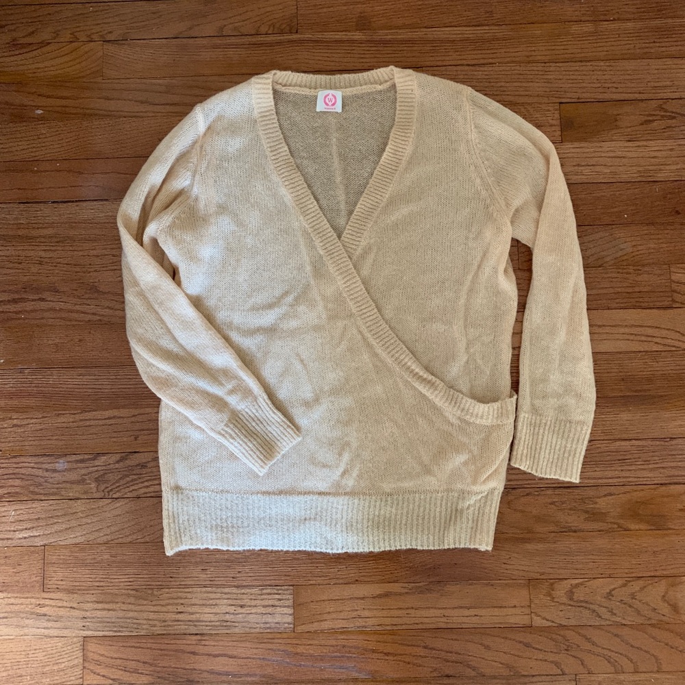 Feminine criss cross front sweater in peach